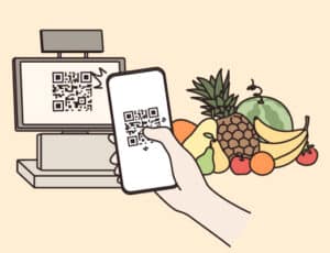 Een hand met een mobieltje die een qr-code scant